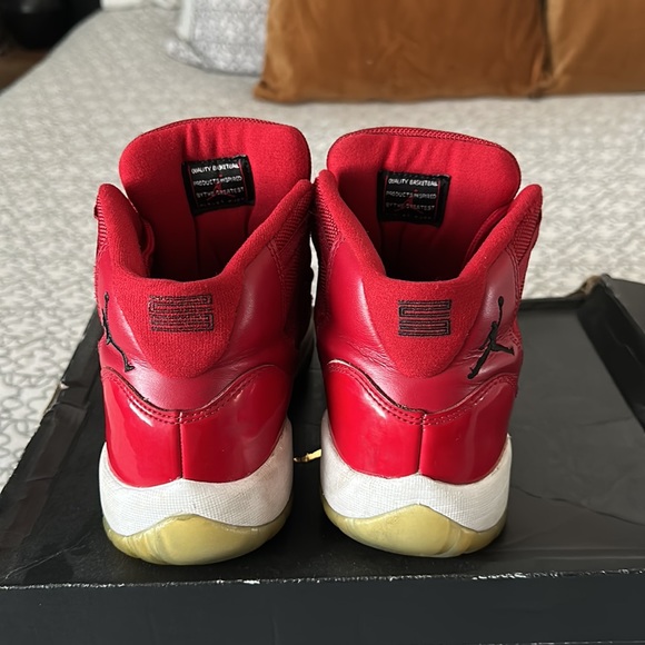Selling these Jordan 11 red sneakers in fair condition. - Picture 2 of 9